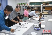六爻免费两岸艺术家在安徽“共绘一幅画”